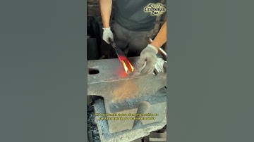 The blacksmith uses a stamping machine to press the handle of a watermelon knife