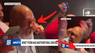 Woman sticks finger up Mike Tyson's nose and almost get Knocked Out!