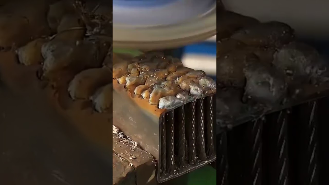 A cable that is being melted to level the iron rod neatly