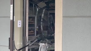 VIDEO NOW: Car crashes through Smithfield Subway