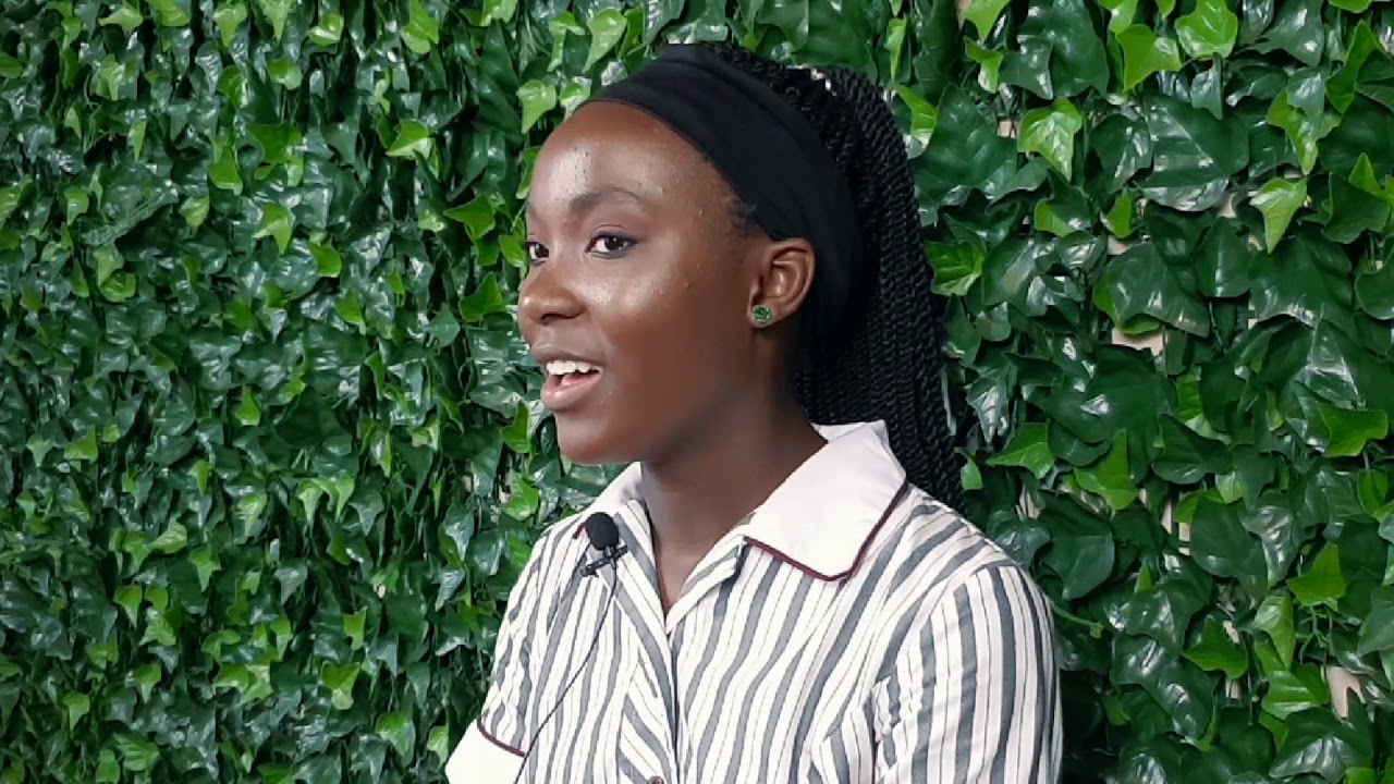 Michaela is talking about "Overcoming the stigma around mental illness"