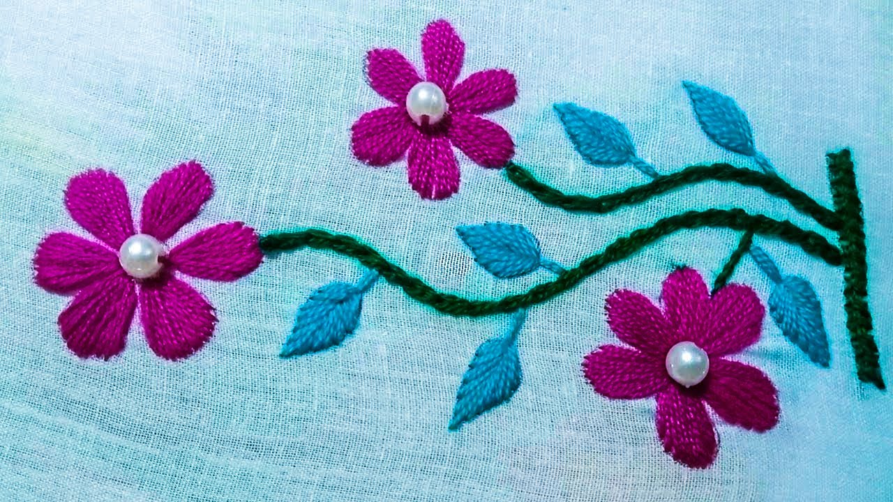 hand embroidery designs of a beautiful flower pattern with