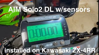 AIM Solo2 DL installed on Kawasaki ZX-4RR with sensors for suspension, brakes, and ECU connection.