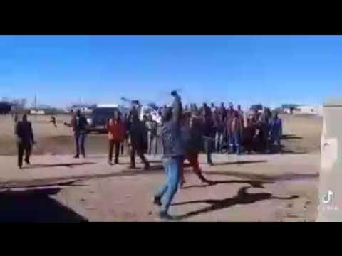 AFRIPICS - Two traditional Xhosa men stick fighting out in the open