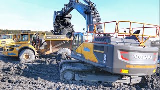 Volvo EC480E Excavator Loading Trucks