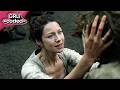 outlander (2016) - claire comforts a traumatized fergus after battle