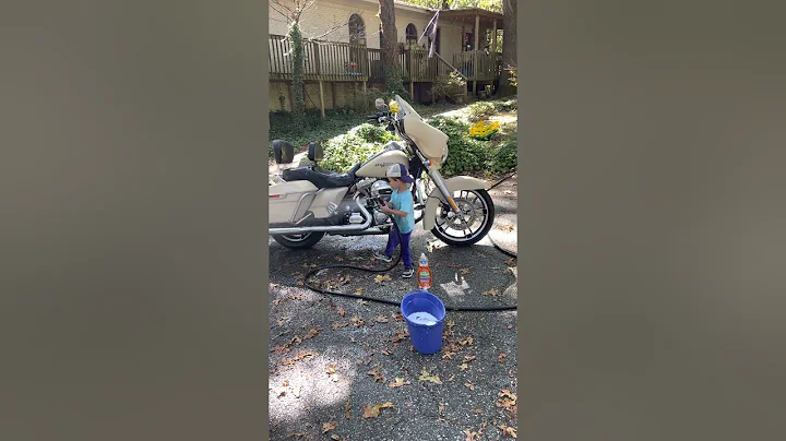 Maddox washes the Street Glide
