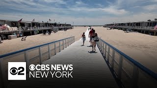 Long Island beach club damaged by tornado partially reopens