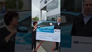 Woman's Club of Fullerton receives check from Ocean Subaru of Fullerton