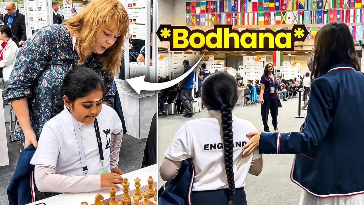Teammates help the youngest player of the team Bodhana Sivanandan before the game