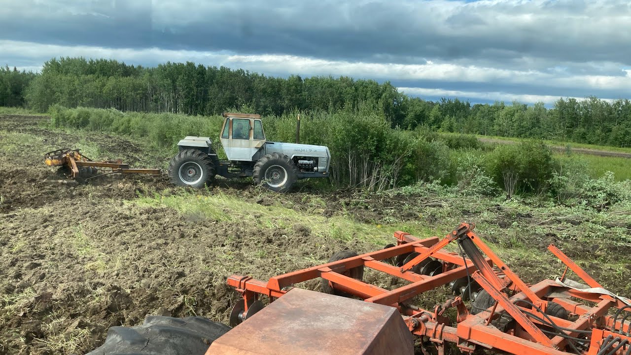 Land clearing with versatile 850 4wd and Rome breaking disc YouTube