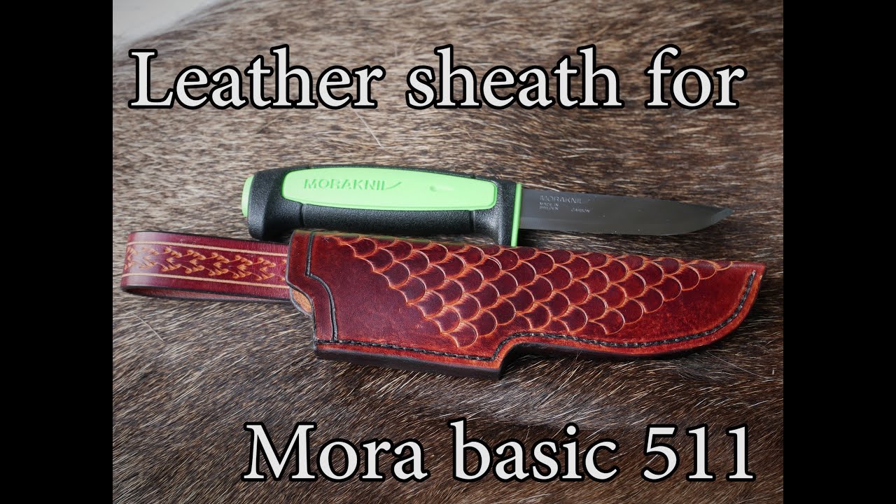 A sheath I finished for my Mora. I've had this knife for almost eight  years, but I hadn't had or made a proper sheath for it until now. My own  pattern too