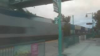 SW Chief Amtrak 4 Eastbound Passes By A Westbound Stack Train Thru Riverside, CA USA 4/10/2020