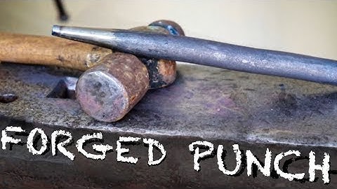Blacksmithing   Car spring into a blacksmiths punch
