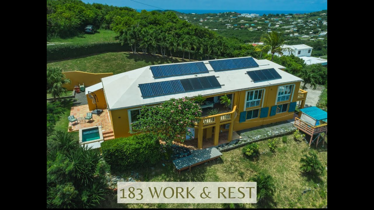 Дом на берегу холма с солнечным бассейном и видом на море в Карибском море, Сент-Круа, Крис Хэнли...