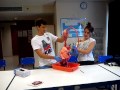 Alejandro and Isabel inflating pig&#39;s lungs