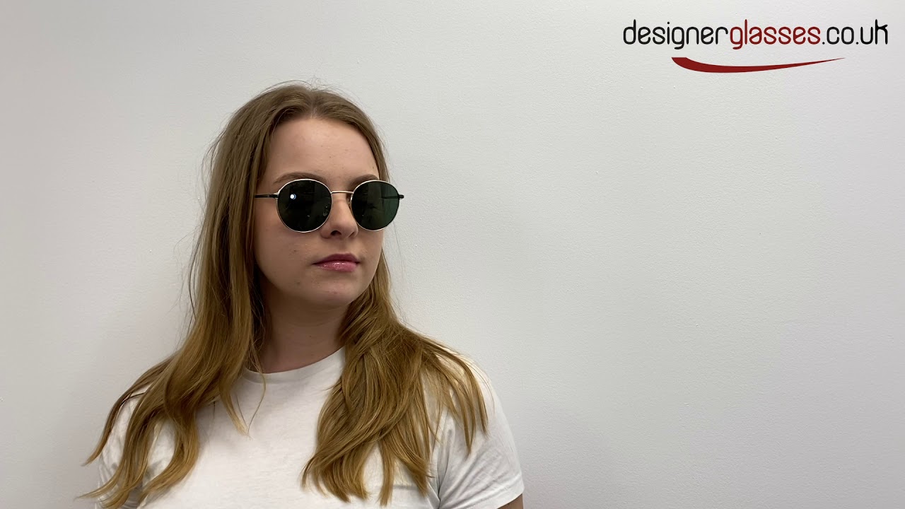 GUCCI GG 0574SK GG0574SK Sunglasses on a 360 turntable and 