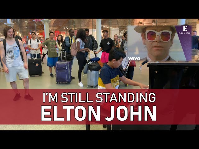 Elton John I'm Still Standing Draws Huge Crowd Public Piano Cover Cole Lam 12 Years Old class=