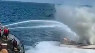 US Coast Guard tackle fire on fishing boat in dramatic video