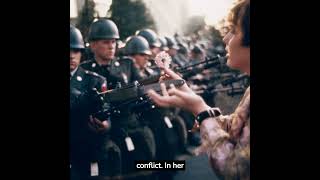 Famous A girl puts a flower in the muzzle of a gun during a protest against the Vietnam War, 1967. #shorts Profile