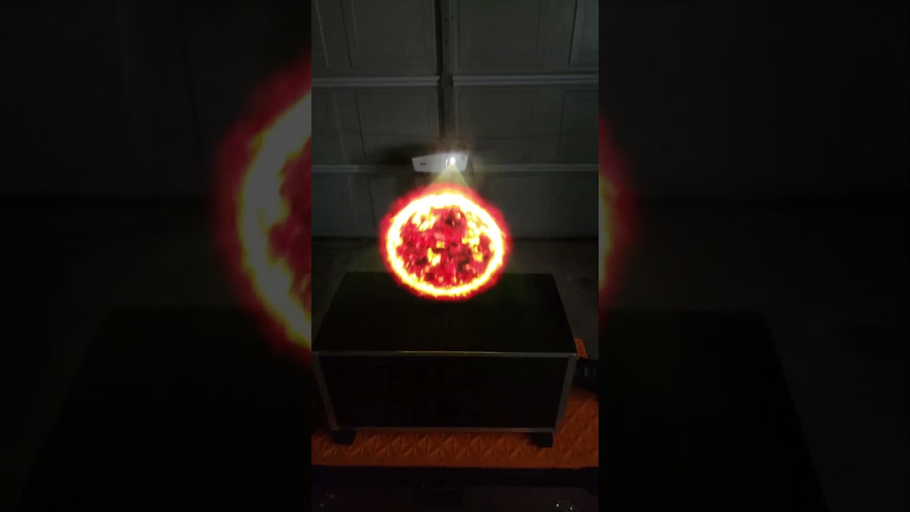 Sun Hologram Projection On Vapor From A Fog Machine