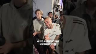 Justin Bieber signing Mexican band