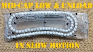 Airsoft mid-cap magazine transperent insert load & unload slow motion