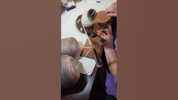 SPINNING TWO YARNS TOGETHER