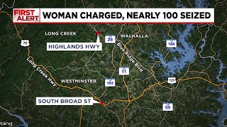 Woman charged after nearly 100 animals found in unsanitary conditions on property