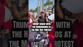 Trump dance with the handmaids at the May Day protest 🤣