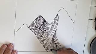 Satisfying drawing of mountains. Doodle or zentangle style relaxing drawing. Calm art therapy, fun.