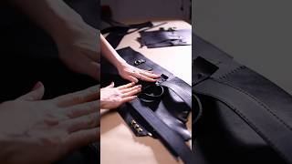 The process of creating a leather backpack with a raw edge a natural cut of vegetable-tanned leather