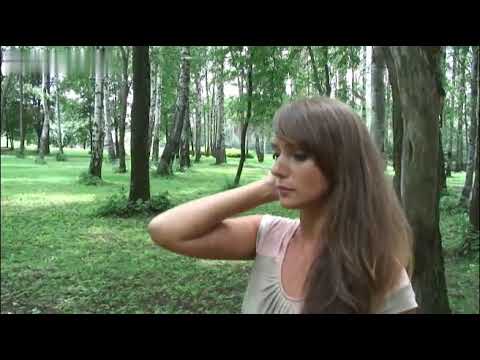beautiful woman walking in the woods