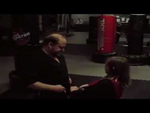 Alex doing belt tie with Paul Trost