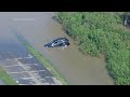 Torrential rain caused flooding in the Houston area, stranding some motorists