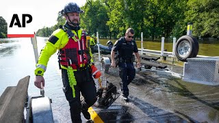 Heavy rains near Houston close schools and flood roadways as officials urge residents to evacuate