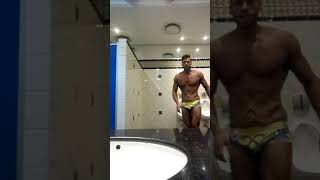 WBFF SA Champion : Working out a posing routine 10min before stage.(Skin surgery?)