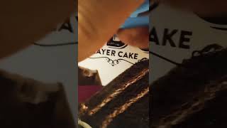 cutting a chocolate fudge layer cake box cutting shorts cut