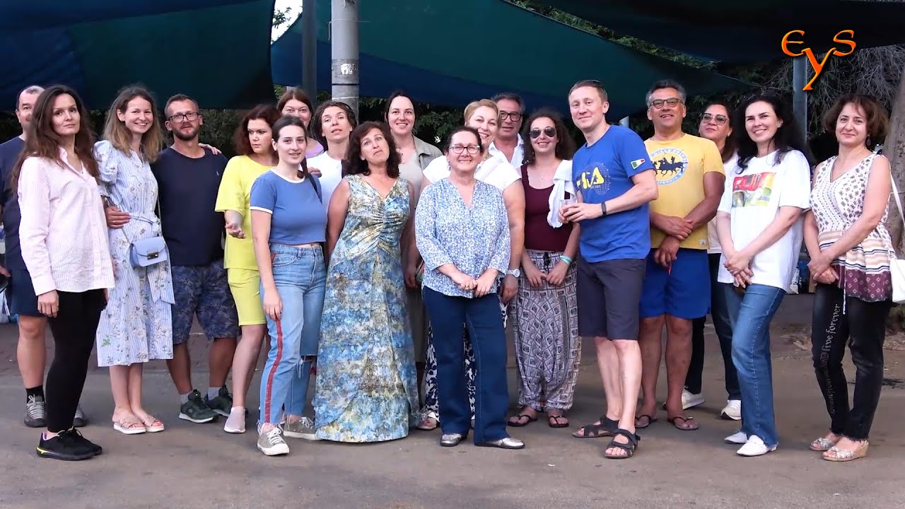 New immigrants to Israel and a teacher meet upon finishing Hebrew course.