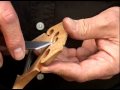 Hand carving the bridge by Hammond Ashley Violins