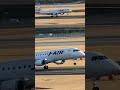 超高層ビルをバックに、タッチダウン、スポイラーアップ！J-AIR Embraer ERJ-190-100(ERJ-190STD) 大阪国際（伊丹）空港 #shorts
