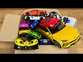 Box full of mini ev supra jeep dhl rollsroyce lexus lm300h bugatti police cars 49