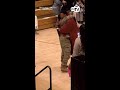 Military sister surprises brother at high school graduation