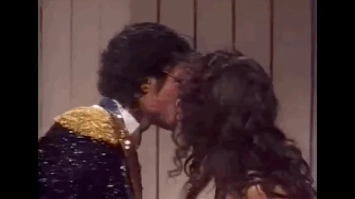 Michael Jackson & Irene Cara kiss backstage at the...