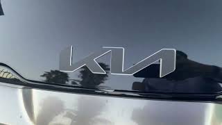 2023 Kia Sportage Hybrid SX Prestige Matte black emblem overlay