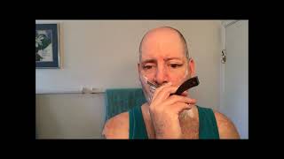 Gold dollar straight razor.