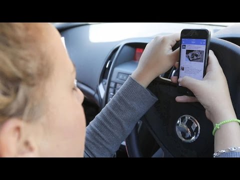 Drivers blame "addiction" for phone use while driving