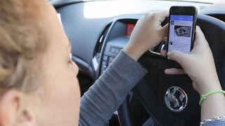 Drivers blame "addiction" for phone use while driving