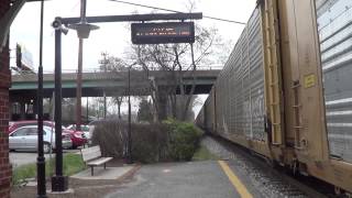 Csx coal train meets auto rack with a sd70mac