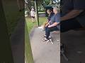 9247. Drop stay behind seated handler's feet distractions kids Nala dog people Park 15 June 2026 MM
